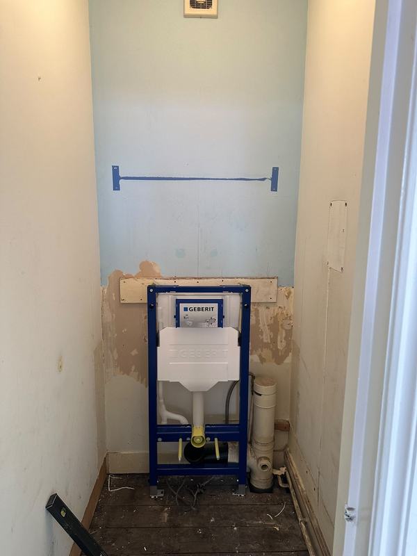 The same WC stripped out before work started