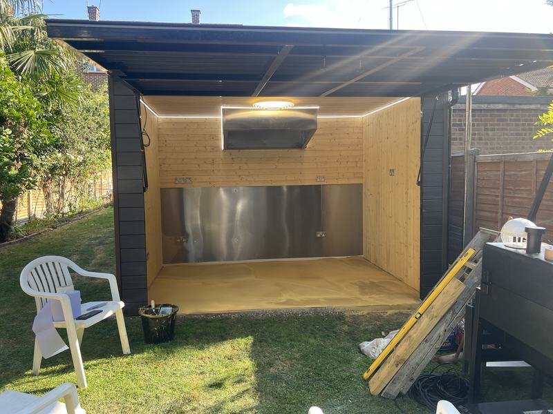 Timber garden building under construction